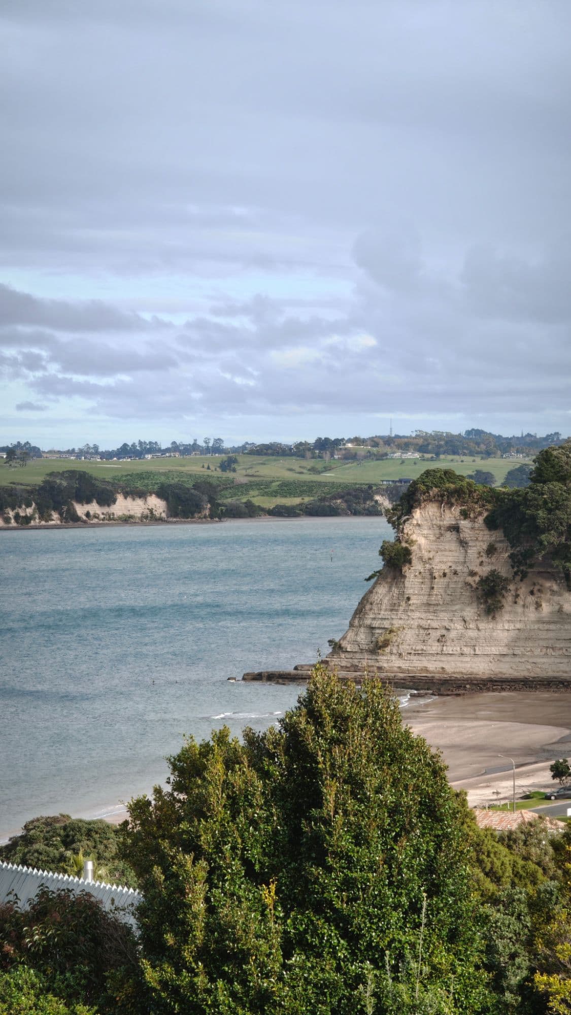 Sandstone cliff and a quiet beach